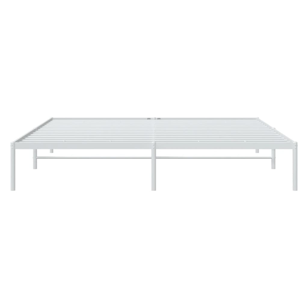 Modern white metal platform bed frame with linen bedding