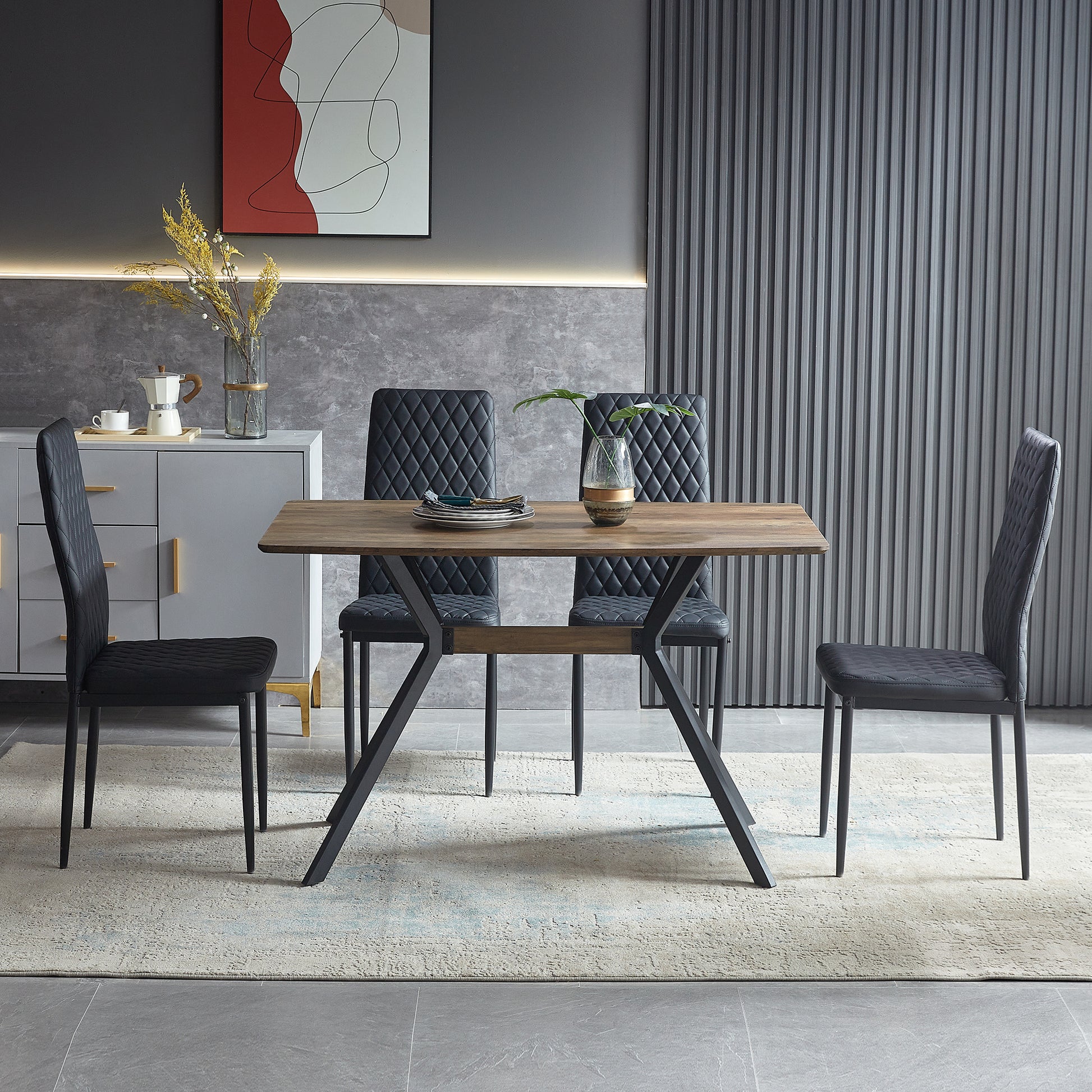 Wooden dining table with black upholstered chairs in a modern dining room