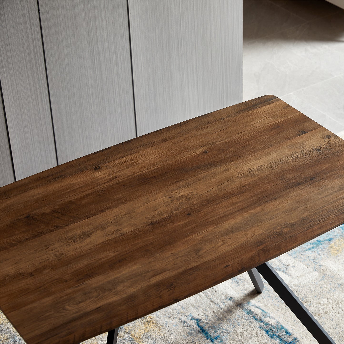 Rustic dark wood grain top on metal frame desk