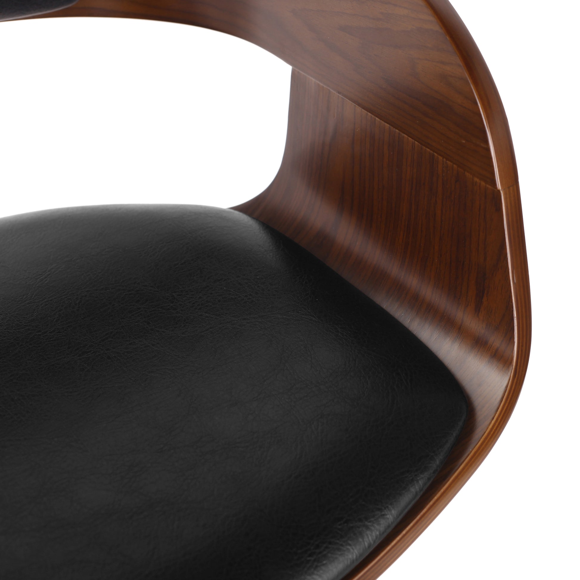 Closeup of curved walnut wood frame with black faux leather seat