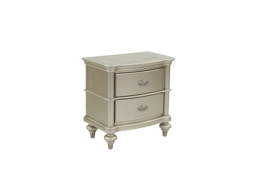 Champagne metallic twodrawer nightstand with ornate drawer pulls and carved legs