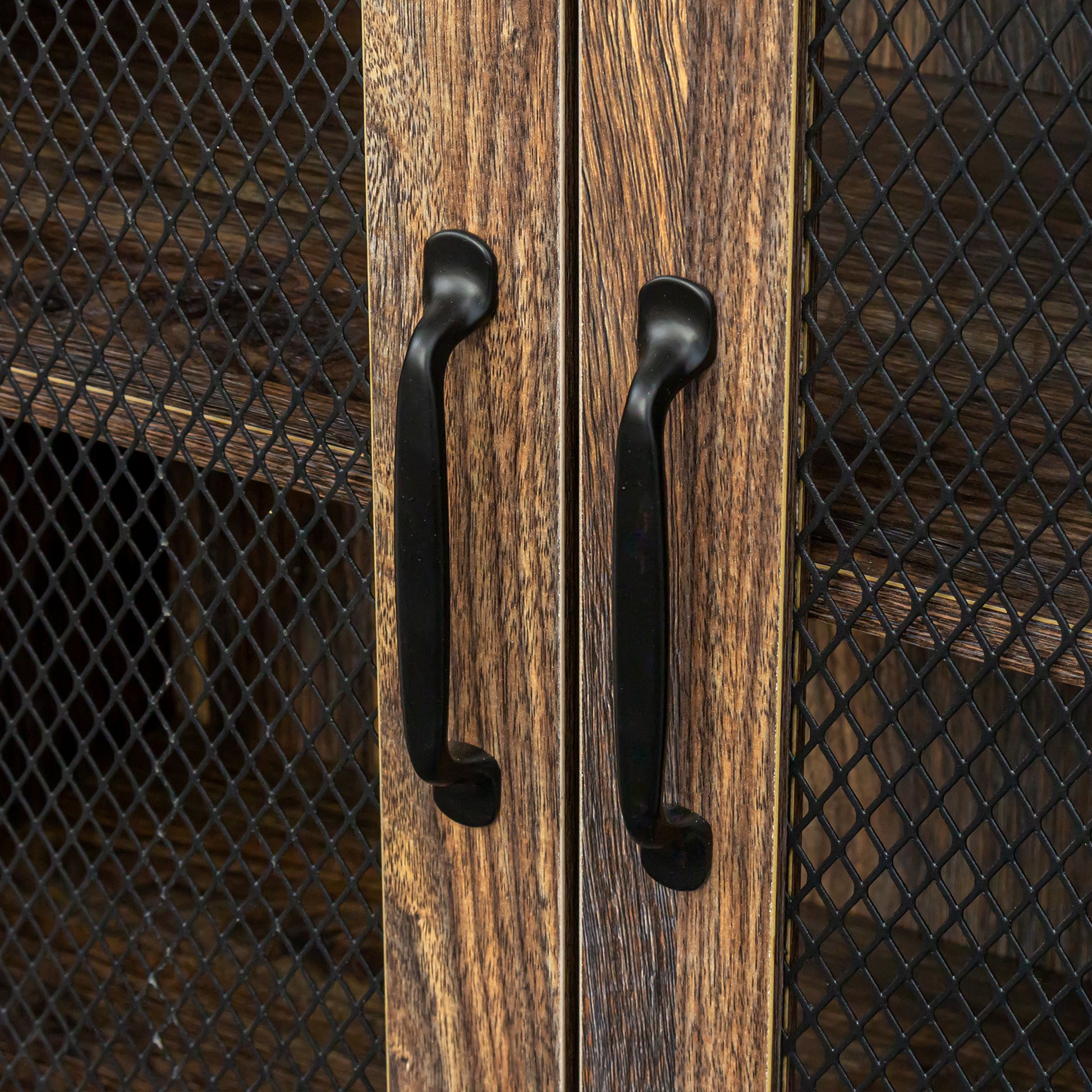 Rustic brown wood cabinet doors with black mesh and curved handles