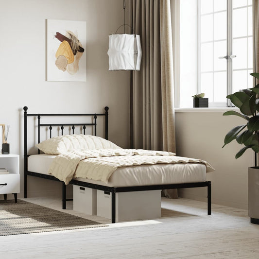 Black metal twin bed frame with decorative headboard