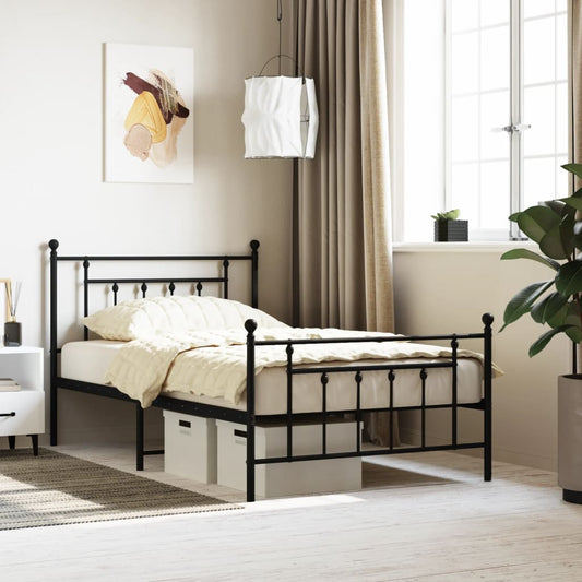 Black metal twin bed frame with decorative finials