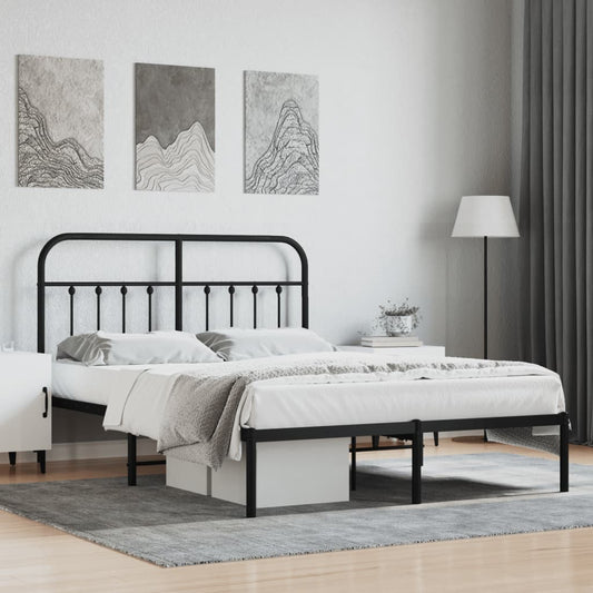 Black metal bed frame with a curved headboard and footboard featuring spindle accents