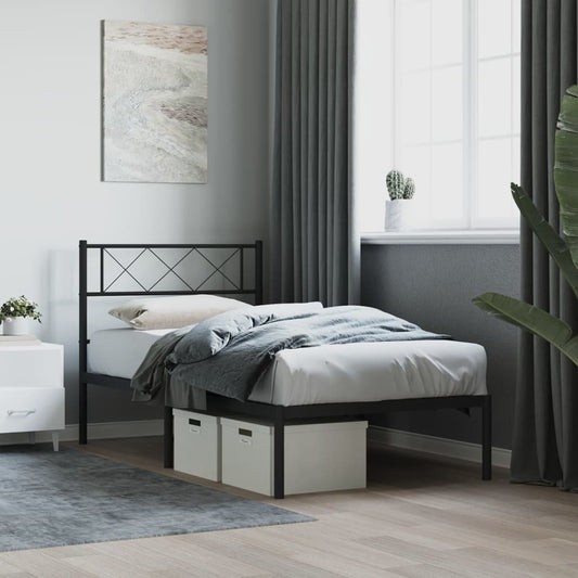 Black metal twin bed frame with decorative crisscross headboard