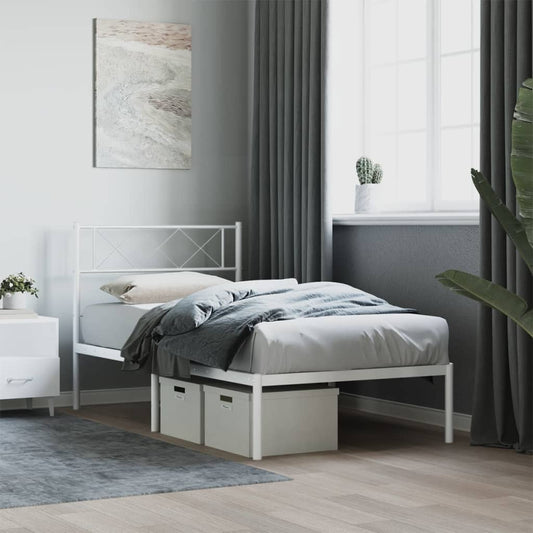 White metal twin bed frame with decorative diamond pattern headboard