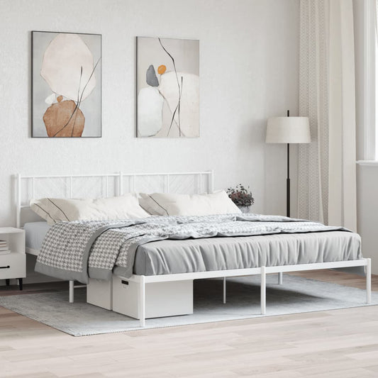 White metal frame bed with diamond pattern headboard and neutral bedding