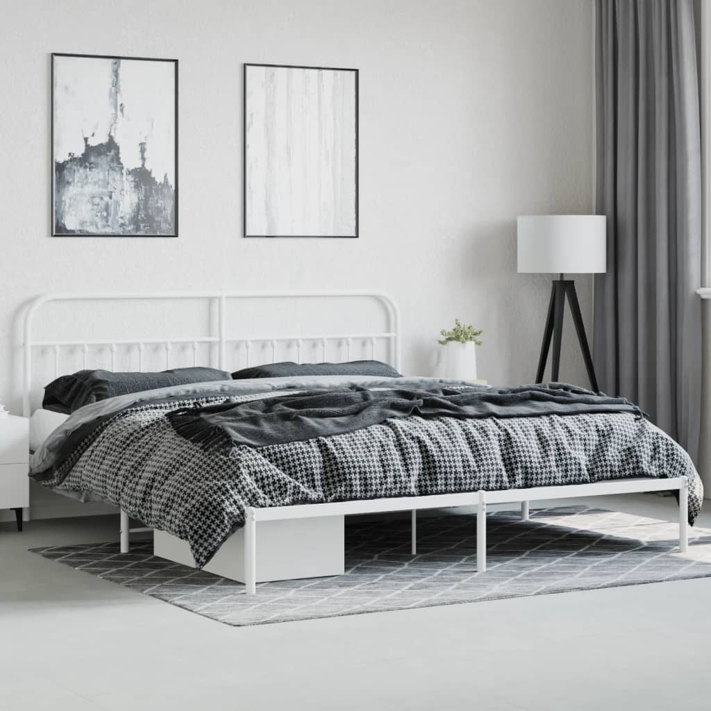 White metal bed frame with ornate headboard
