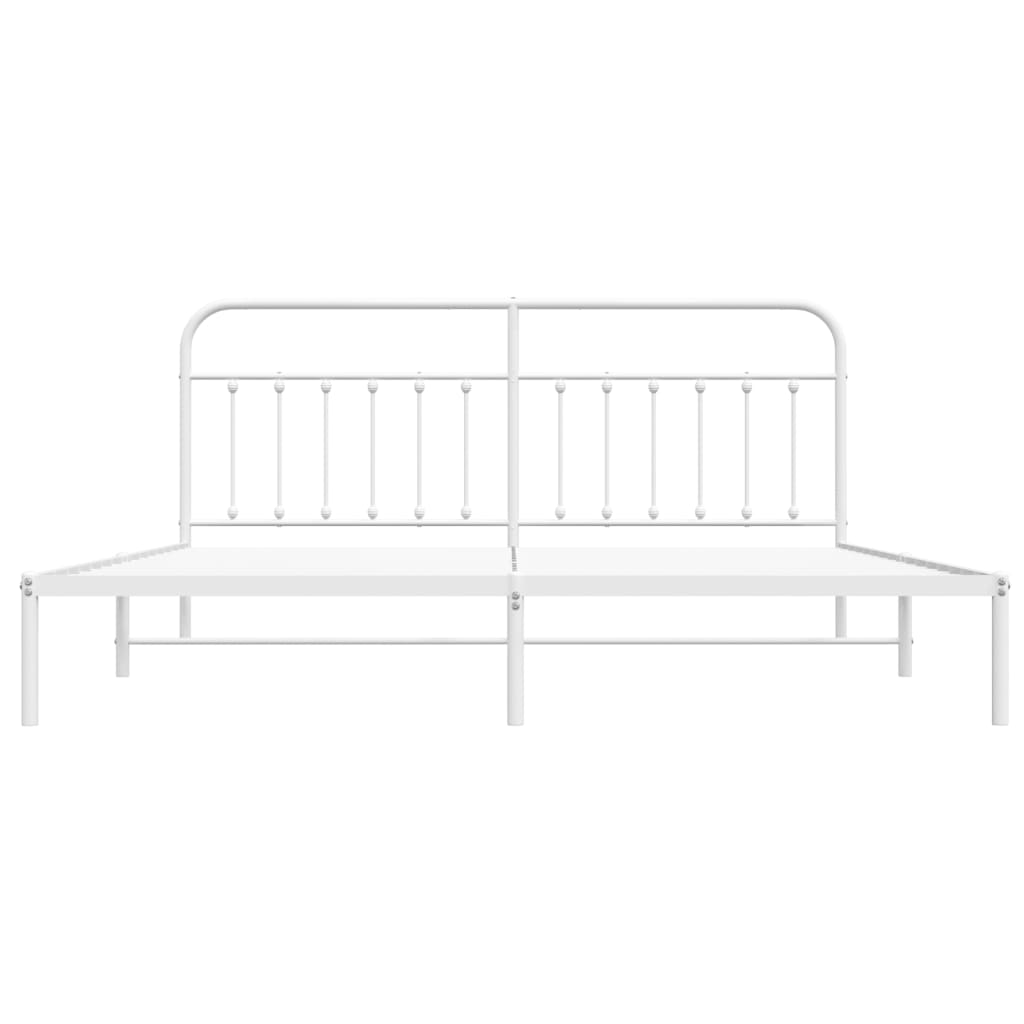 White metal bed frame with arched headboard and mattress support