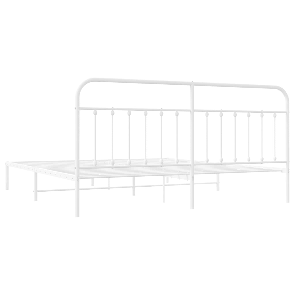 White metal bed frame with ornate headboard and slatted support