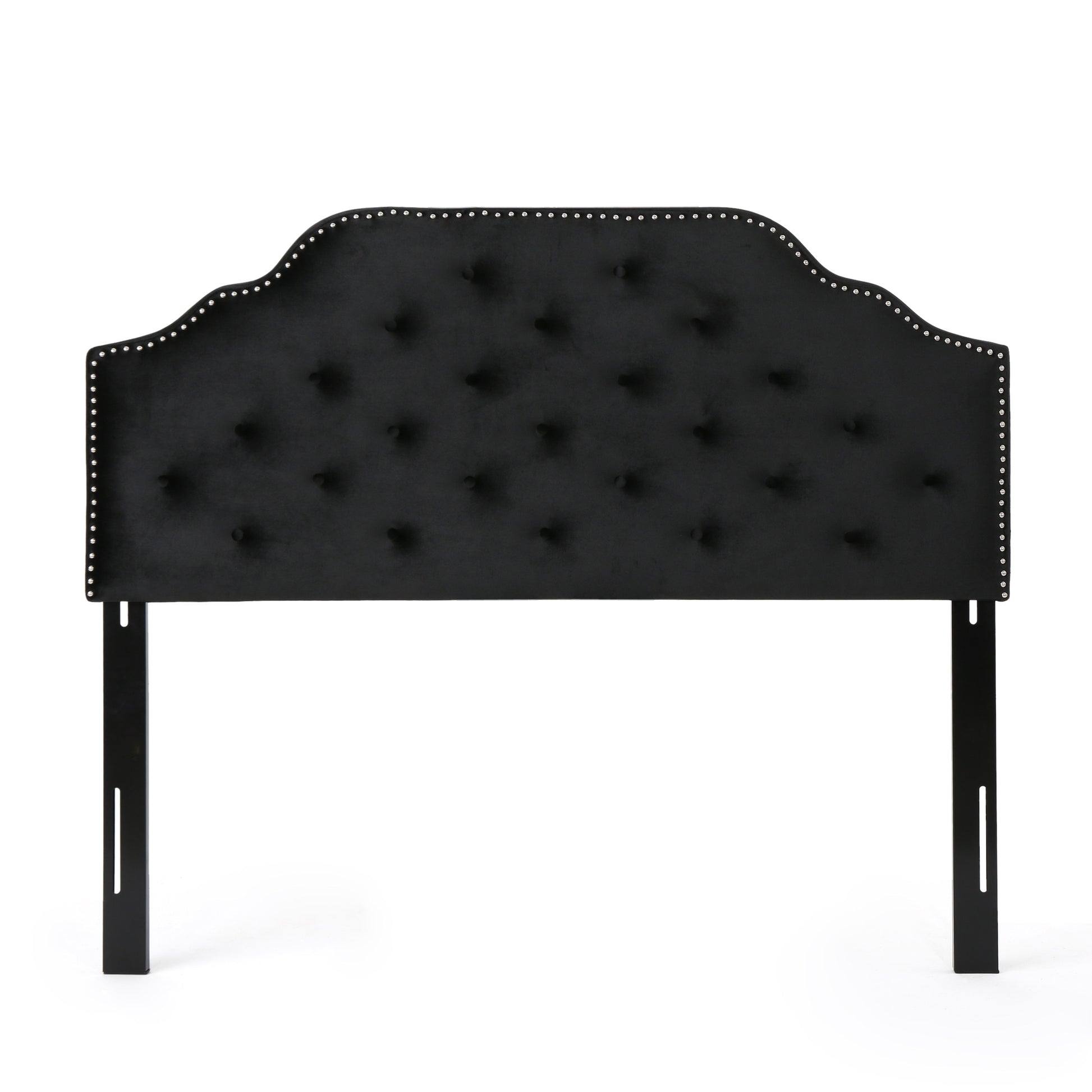 Black velvet headboard with diamond tufting and silver nailhead trim