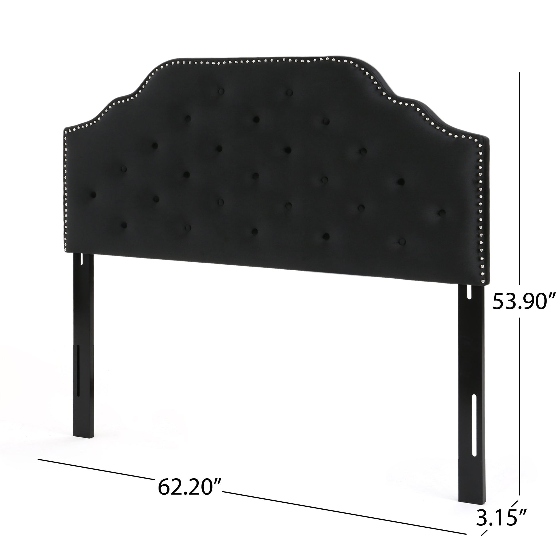 Black velvet tufted headboard with silver nailhead trim and scalloped edge