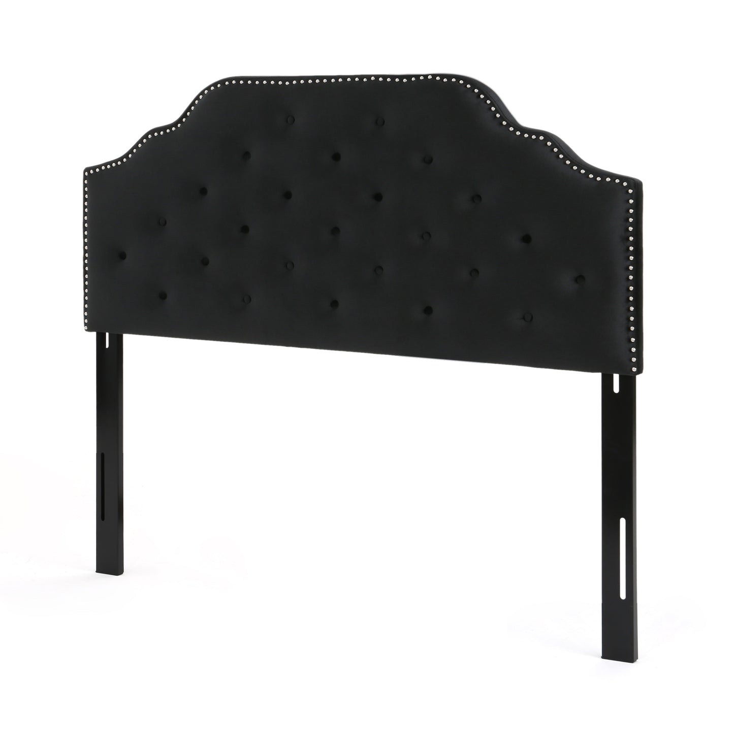 Black velvet arched headboard with diamond tufting and silver nailhead trim