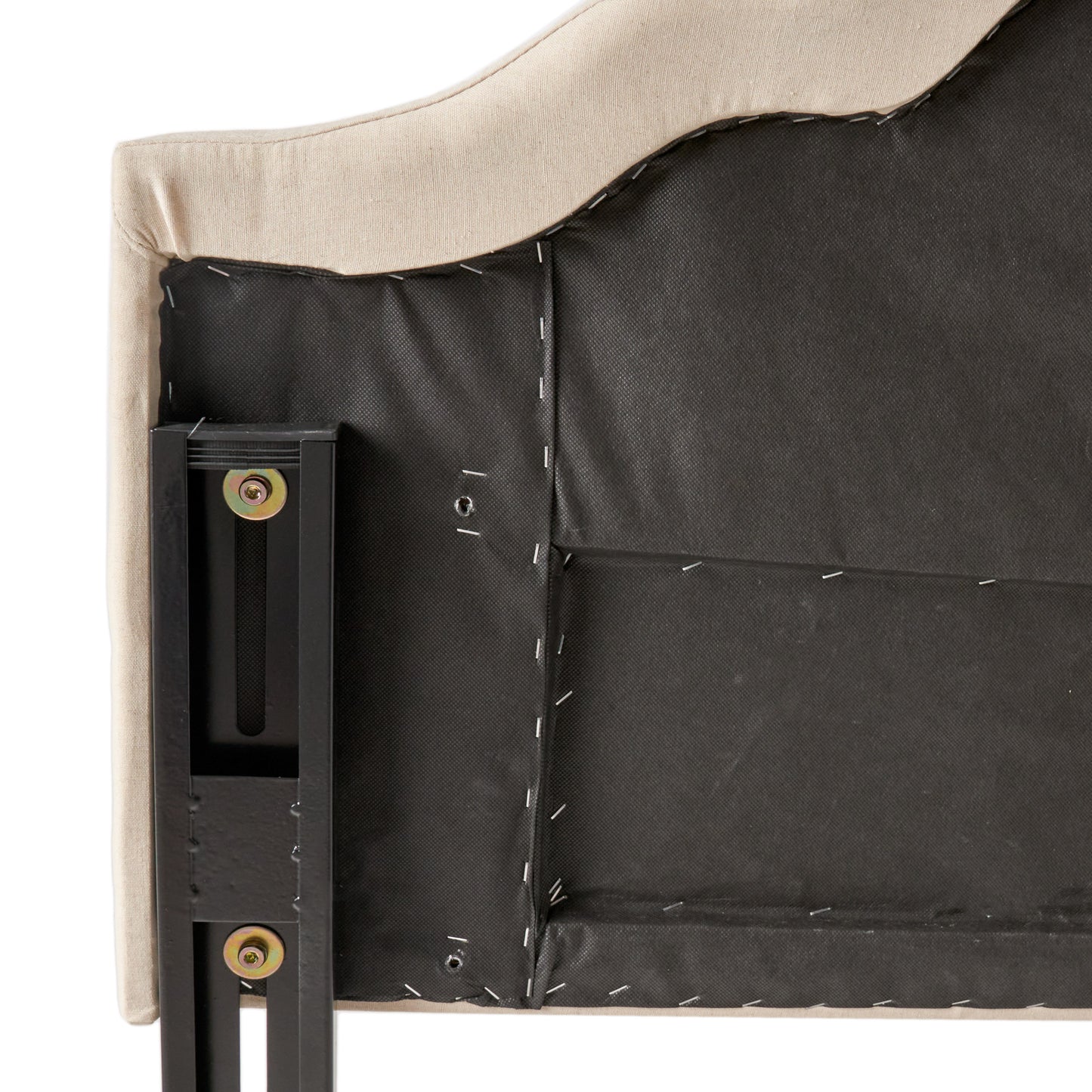 Beige upholstered headboard back view with black metal frame