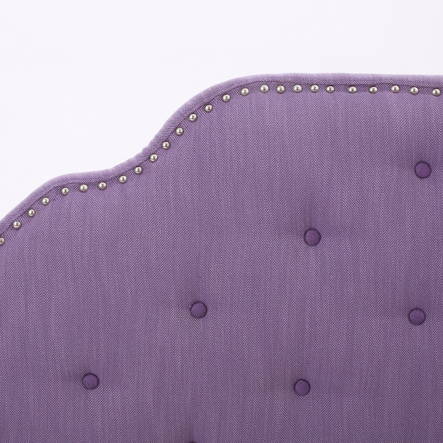 Purple tufted headboard fabric with silver nailhead trim detail