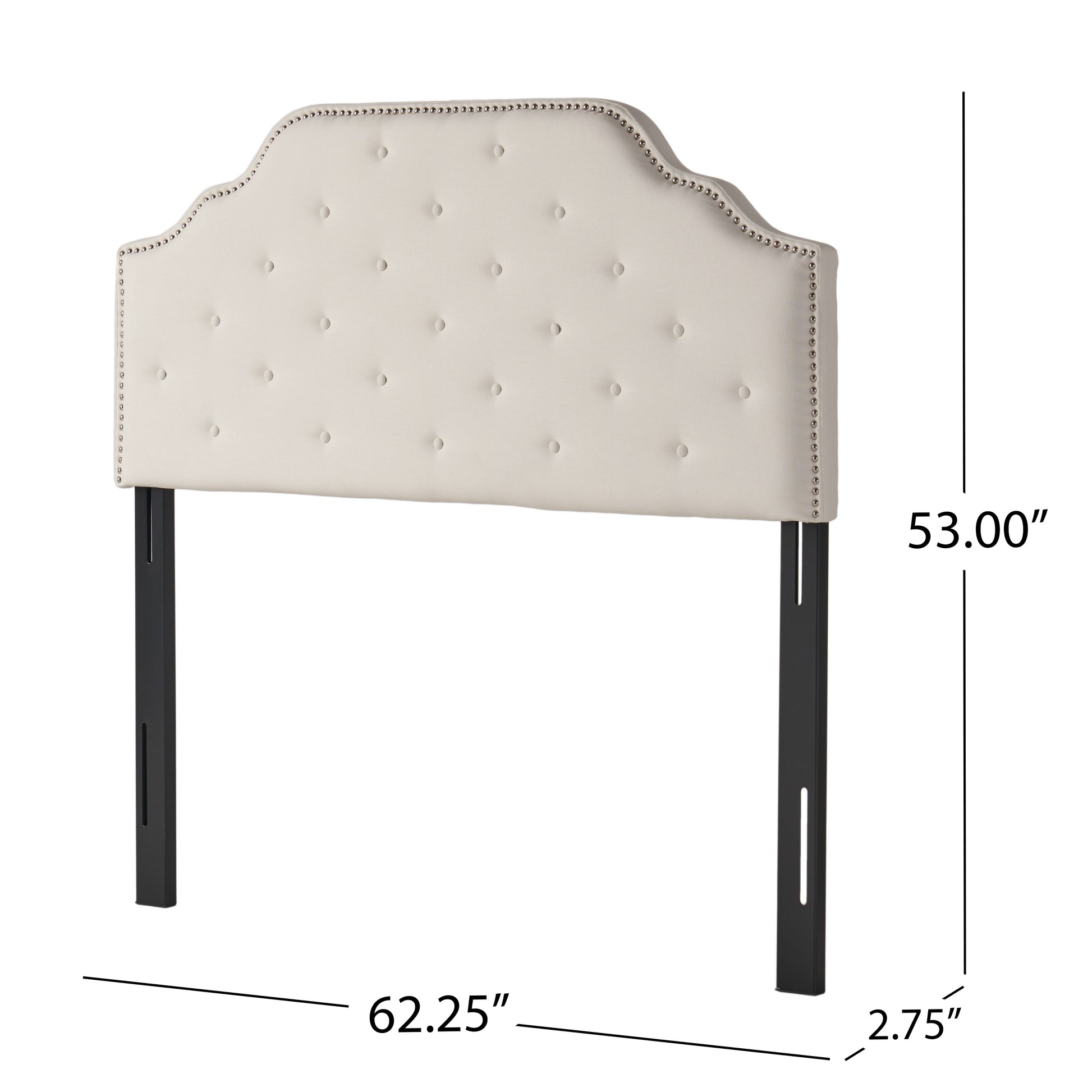Cream tufted headboard with silver nailhead trim and black legs