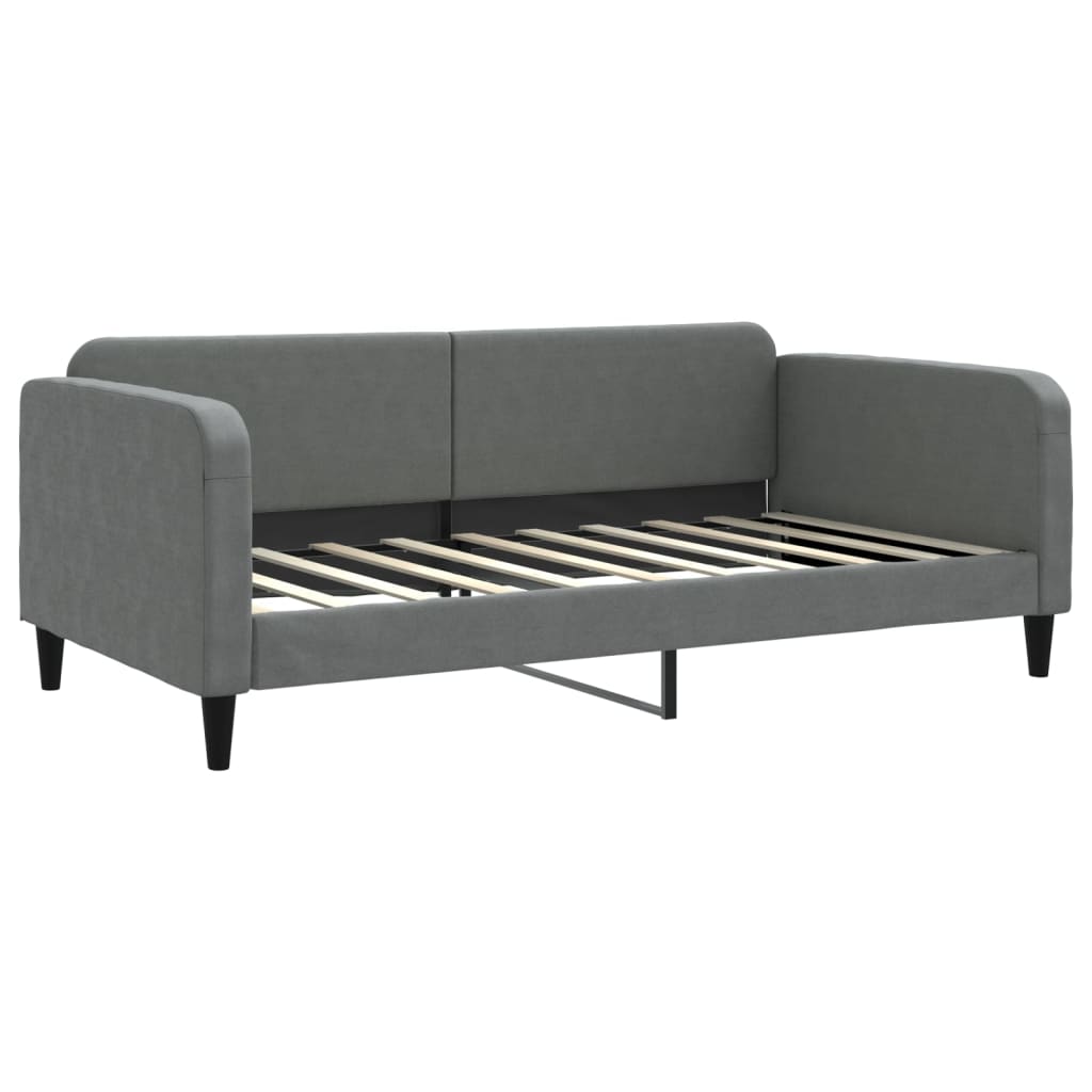 Grey fabric sofa viewed from the back with black legs