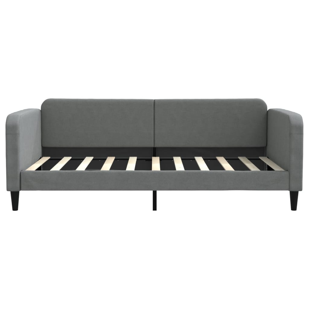 Gray upholstered daybed with wooden slats and dark tapered legs