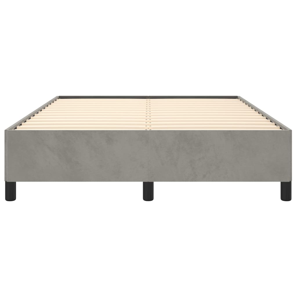 Gray suede upholstered bed frame with white mattress
