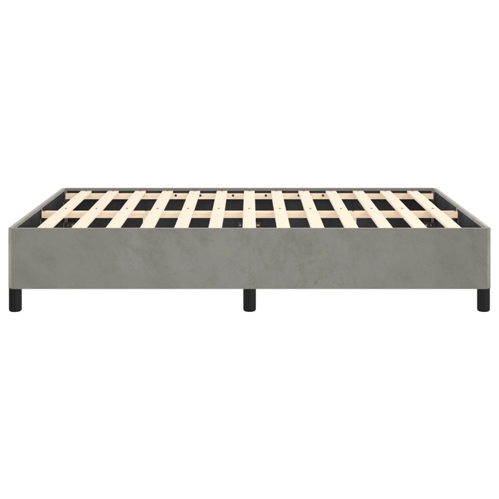 Gray upholstered platform bed frame with wooden slats