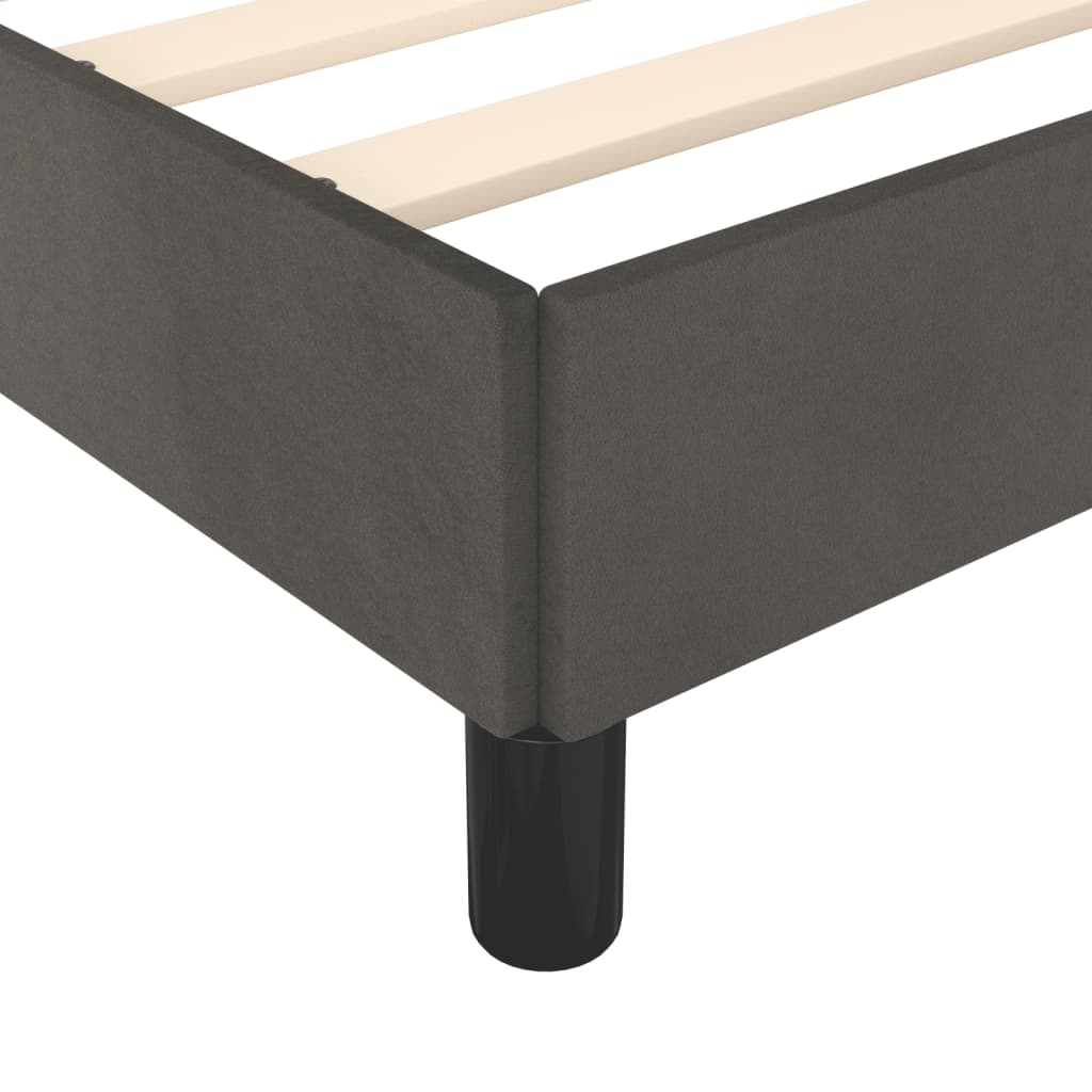 Charcoal grey velvet upholstered bed frame with wooden slats