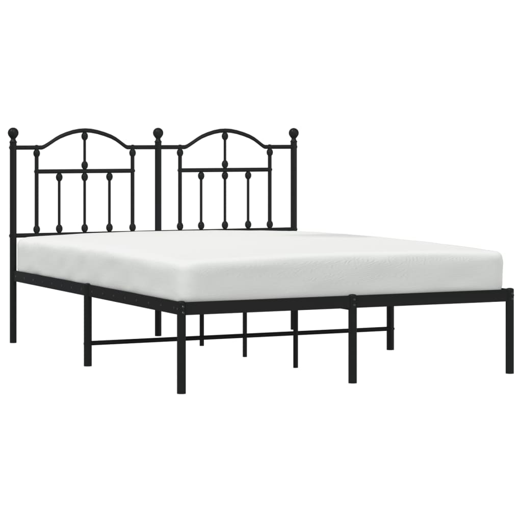 Black metal bed frame with ornate double arched headboard
