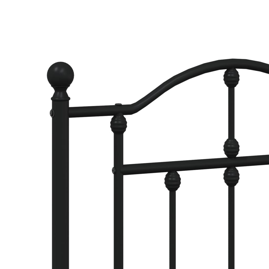 Black metal platform bed frame with ornate headboard and slat support
