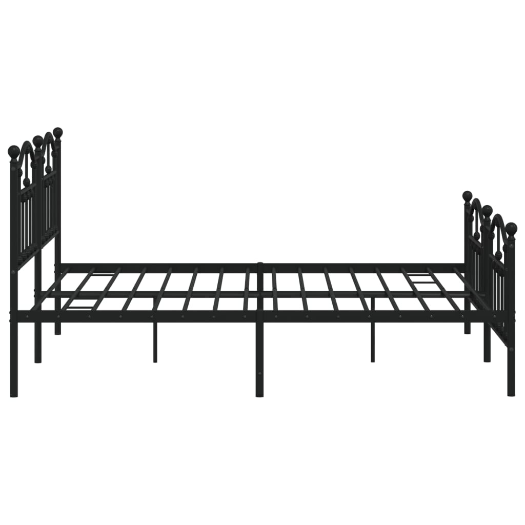 Black metal twin bed frame with ornate headboard and footboard