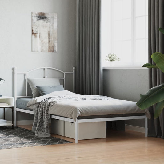 White metal twin bed frame with arched headboard and footboard