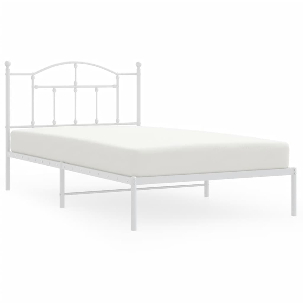 Silver metal twin bed frame with ornate headboard and slatted base