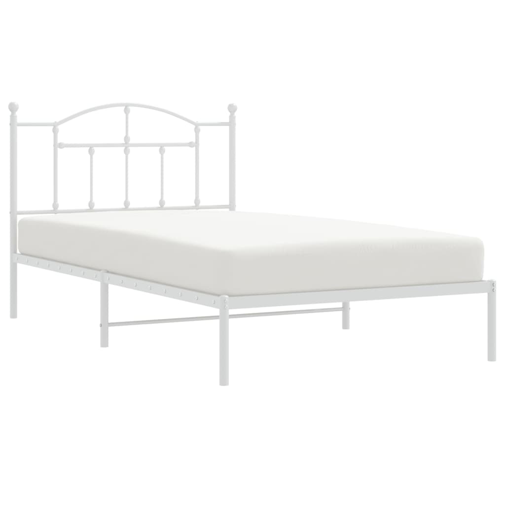 White metal twin bed frame with arched headboard and slatted base