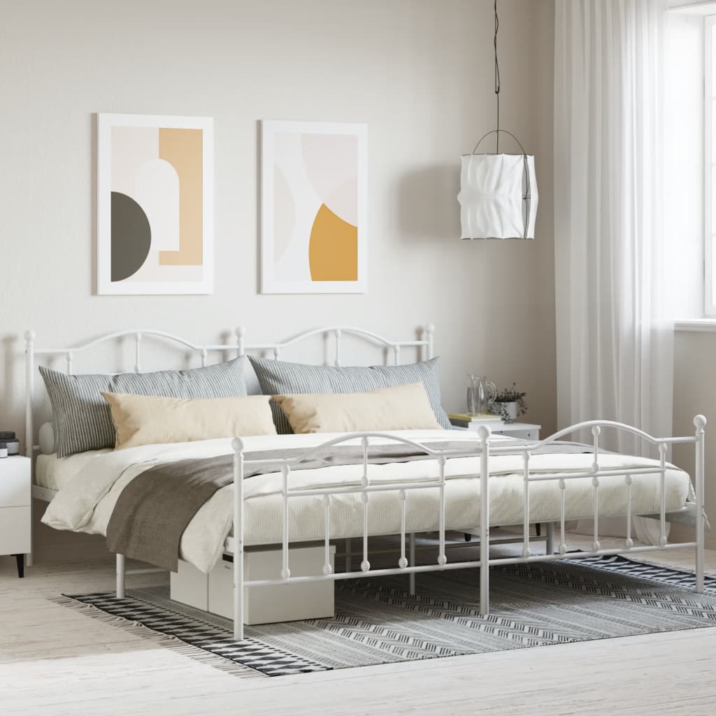 White metal frame queen bed with decorative headboard and footboard