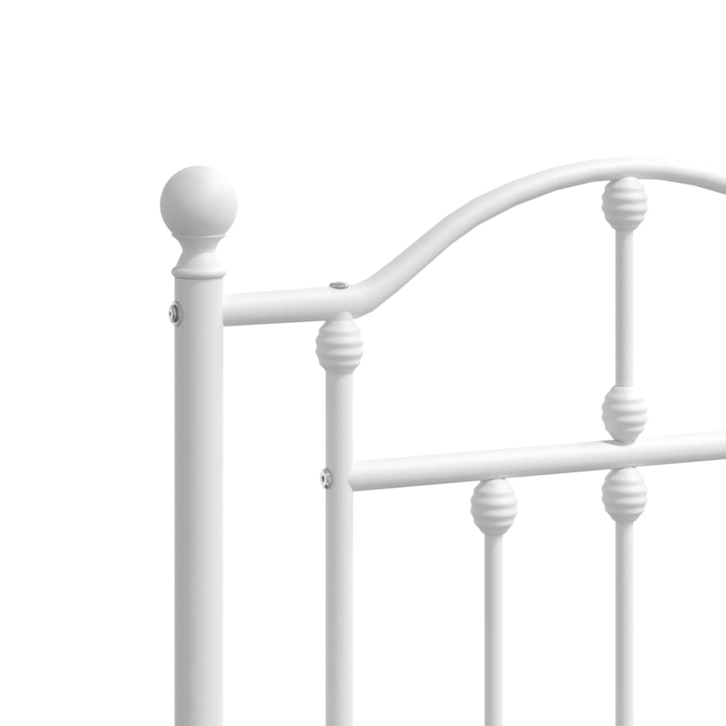 White metal bed frame with ornate headboard and footboard