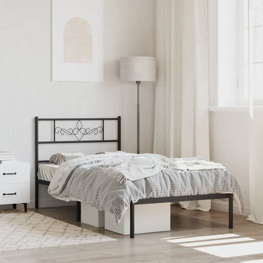 Black metal twin bed frame with ornate headboard and storage drawers under the mattress