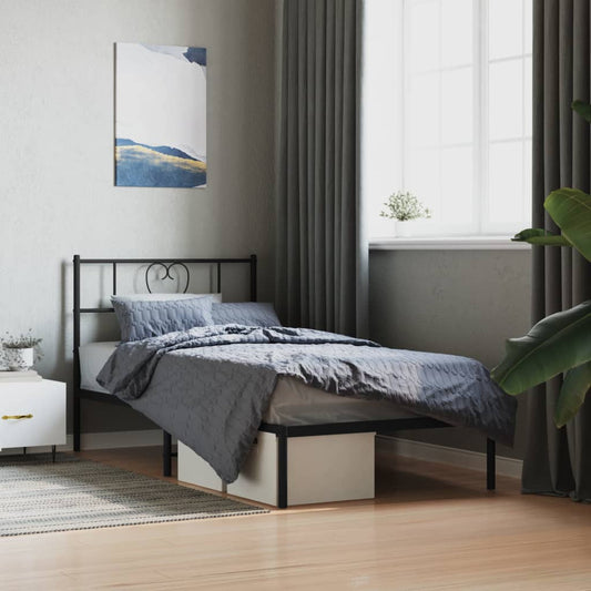 Black metal twin bed frame with heartshaped headboard detail