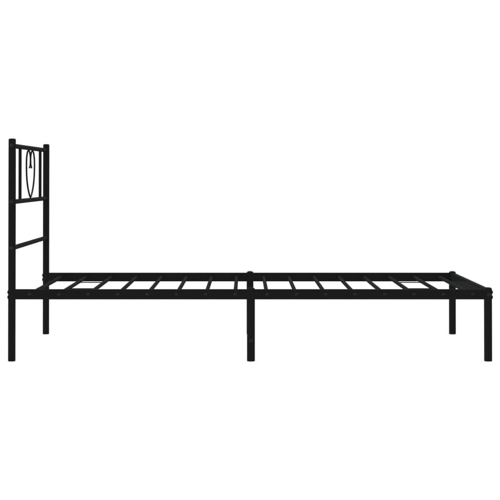 Black metal bed frame with heartshaped headboard detail