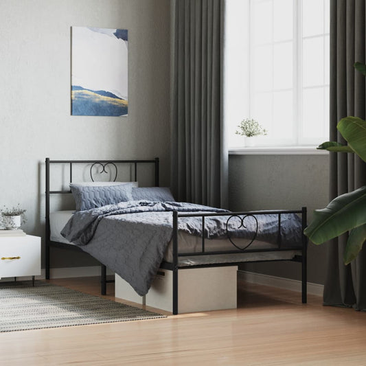 Black metal twin bed frame with heartshaped headboard detail