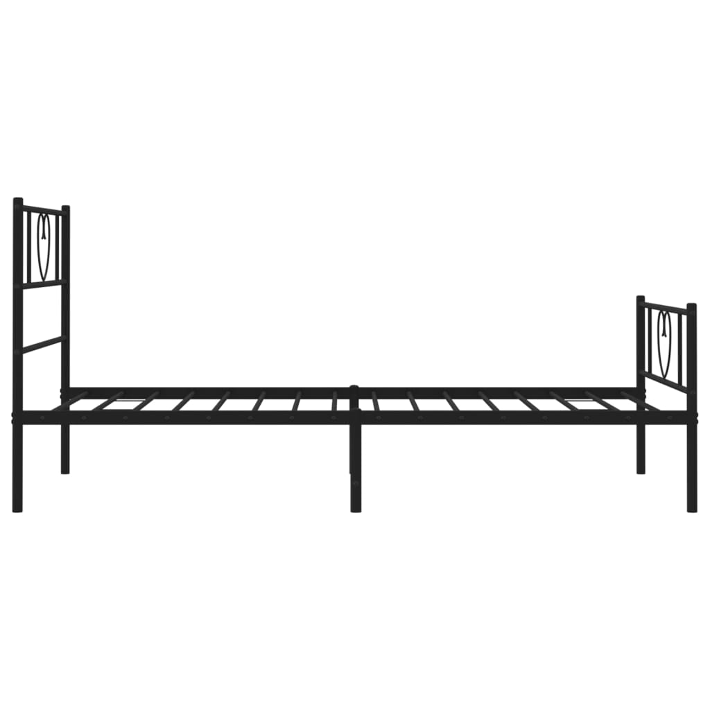 Black metal twin bed frame with heart design on headboard