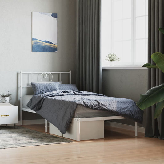 White metal twin bed frame with heart headboard and storage shelf
