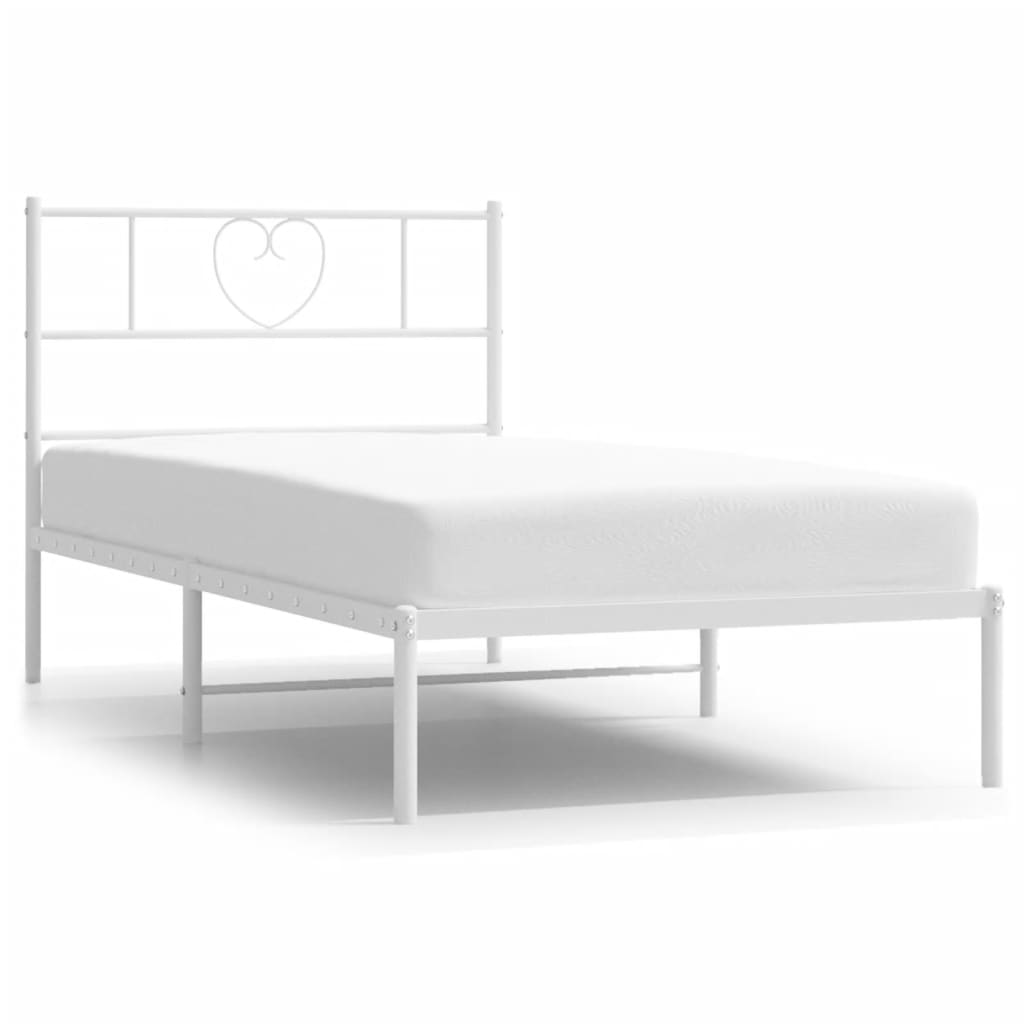 White metal twin bed frame with heartshaped headboard and detailed dimensions