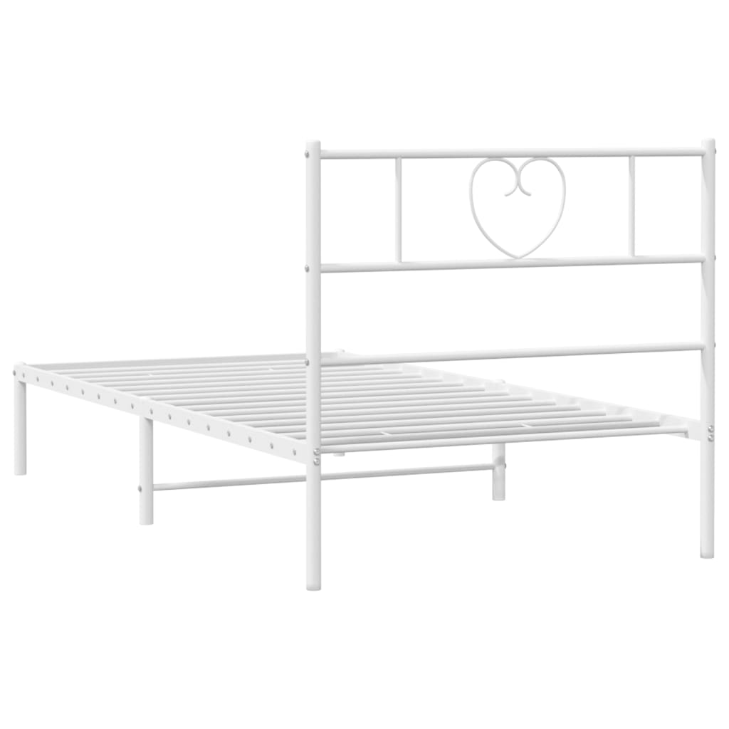 White metal bed frame with heart headboard design