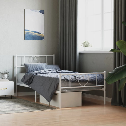 White metal twin bed frame with heart headboard detail