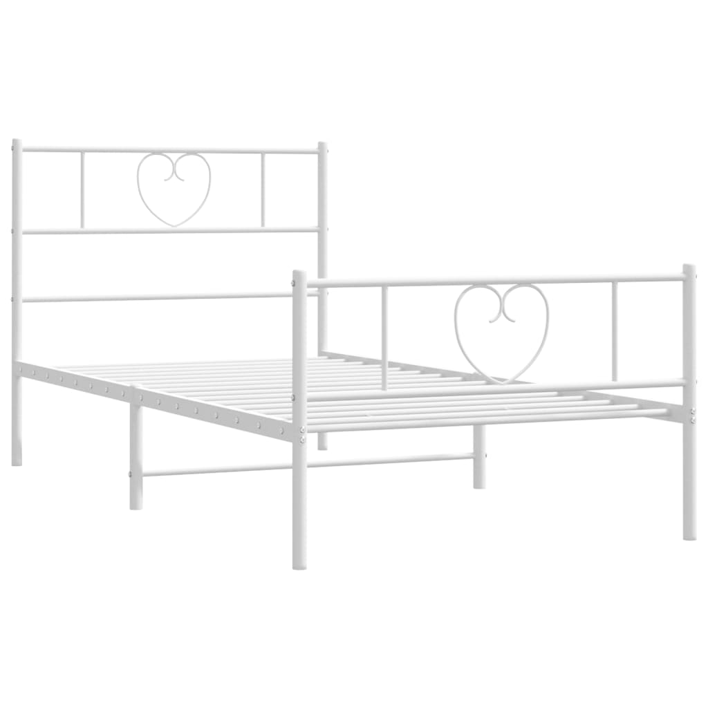 White metal twin bed frame with heart detailing