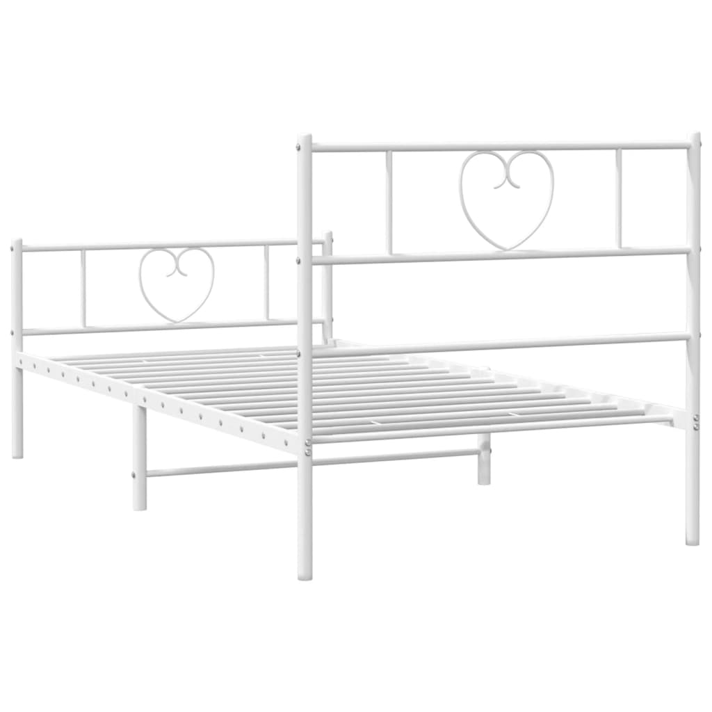 White metal twin bed frame with heart headboard detail
