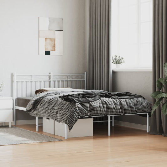 White metal platform bed frame with decorative headboard detail