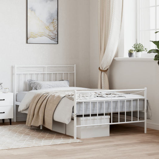 White metal bed frame with decorative headboard and footboard
