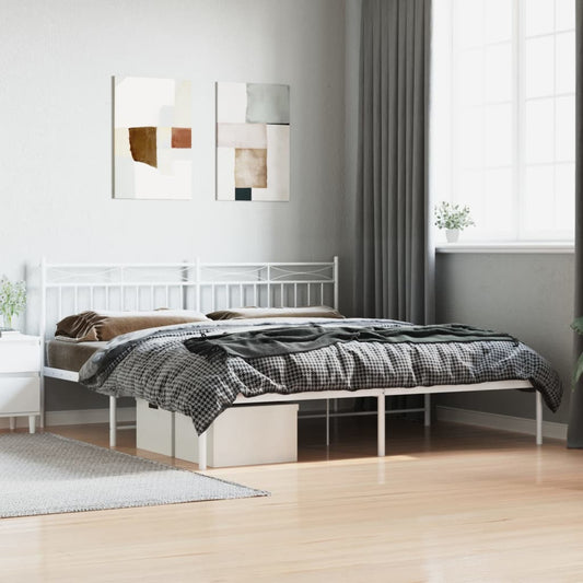 White metal platform bed frame with ornate headboard