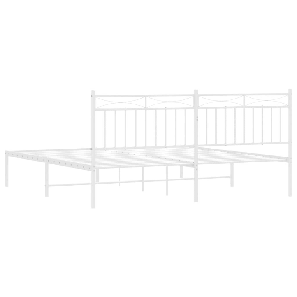 White metal bed frame with ornate headboard and footboard