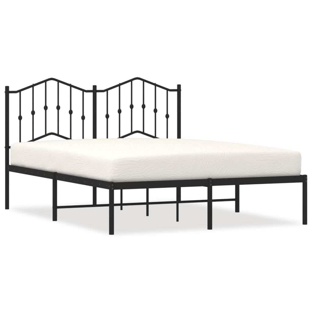 White metal bed frame with ornate headboard and slatted base showing dimensions